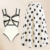 Swimsuit and polka dot skirt